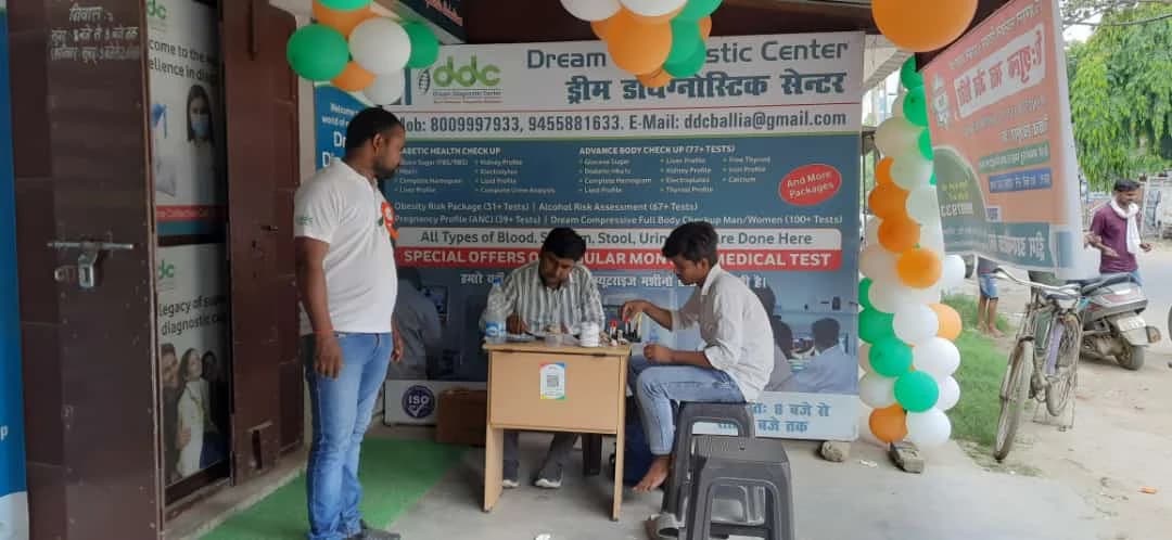 DDC a lab assistant taking blood sample